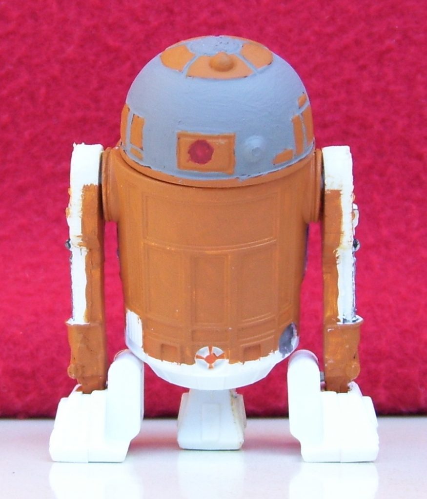 custom narancs asztroszer robot figura hátulról
